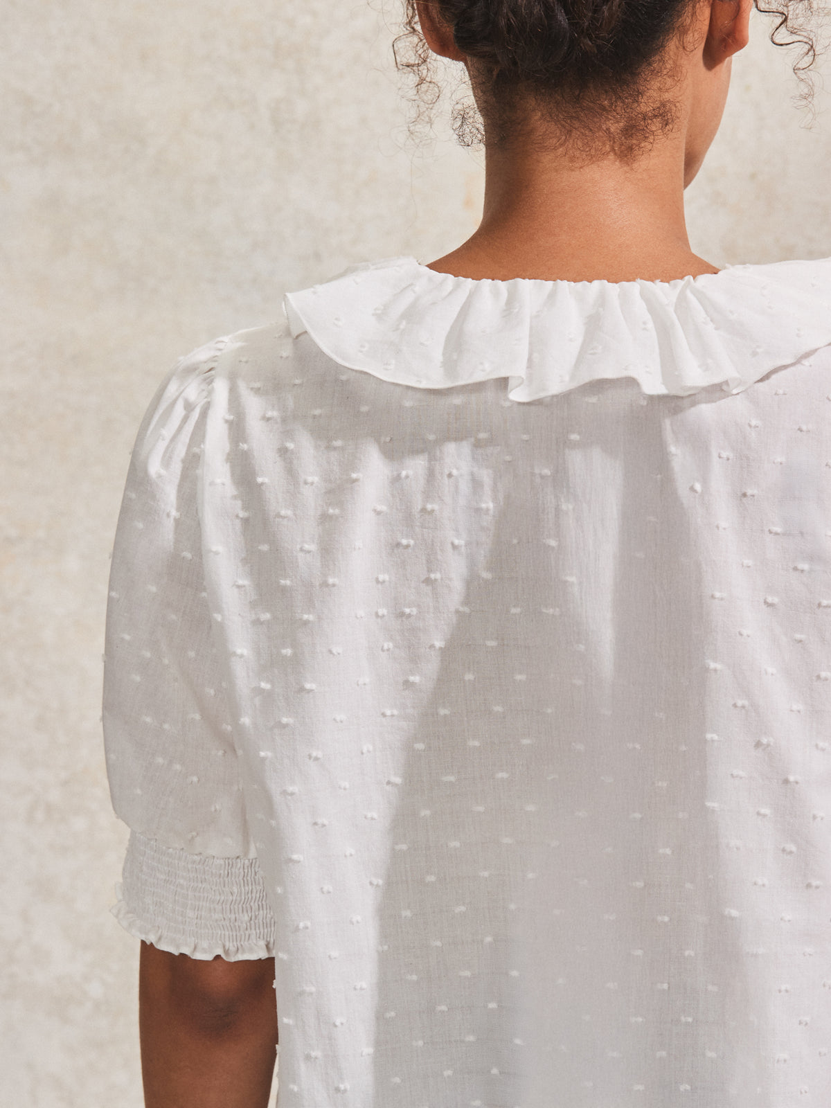 Ivory Dobby Ruffle-Front Blouse
