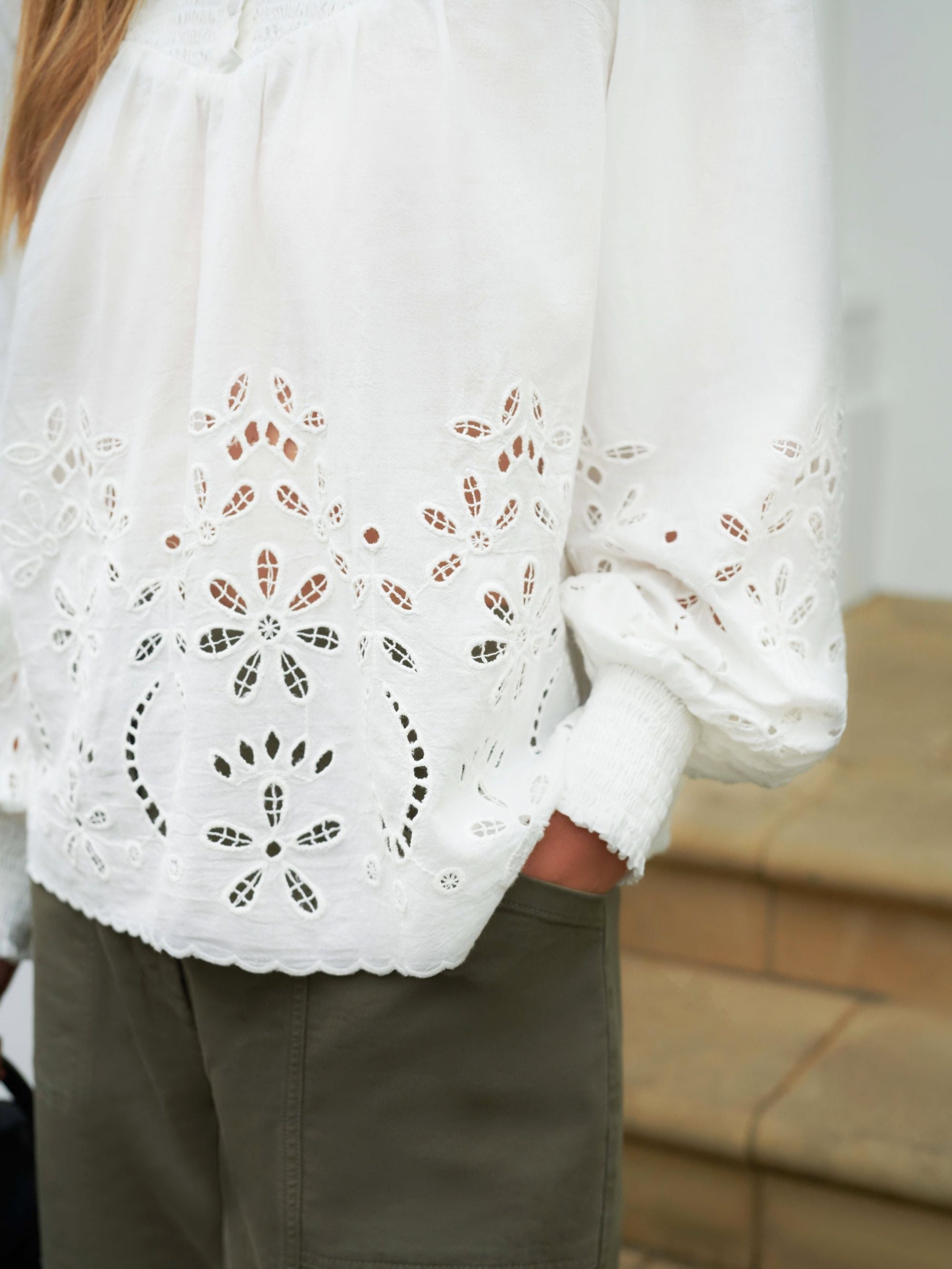 white cut out blouse