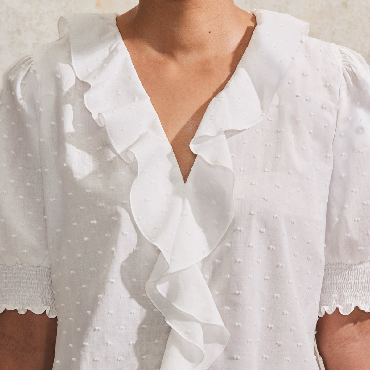 Ivory Dobby Ruffle-Front Blouse – Ro&Zo