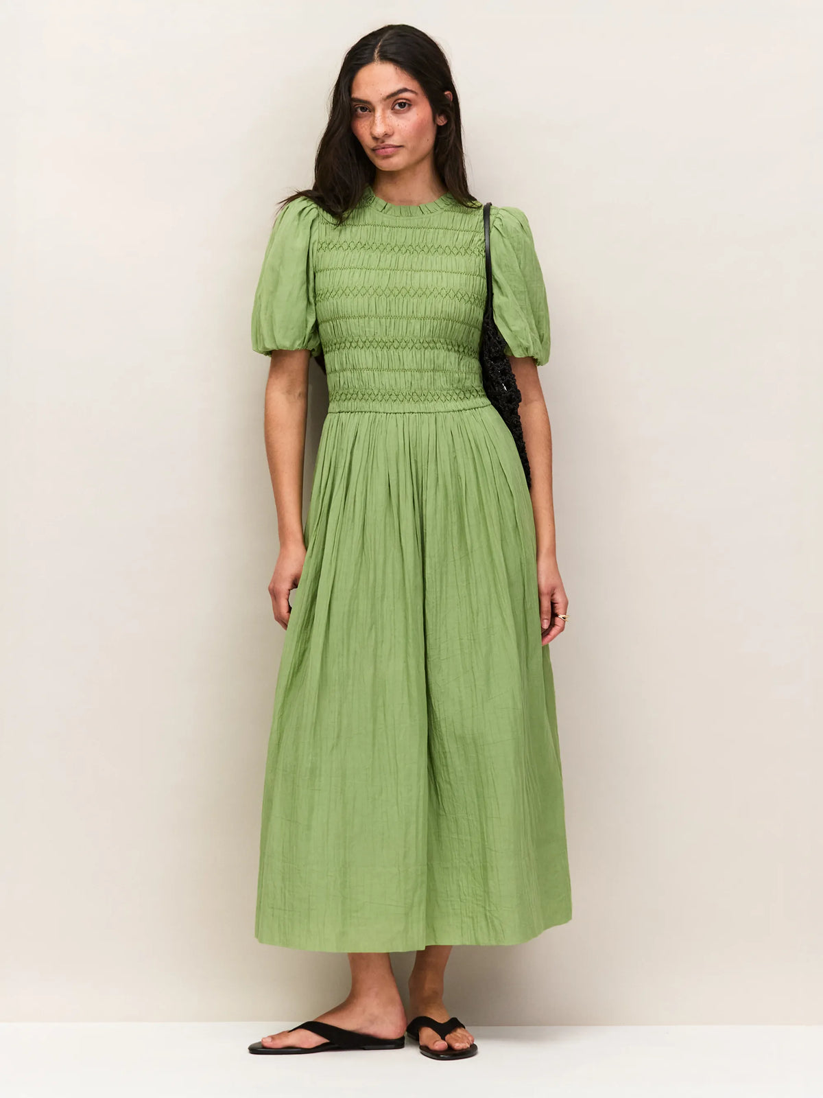 Green cotton midi dress with shirred bodice and puff sleeves