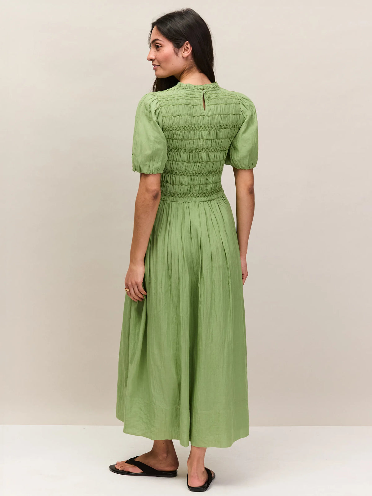 Green short sleeve cotton dress with gathered skirt and shirred detail