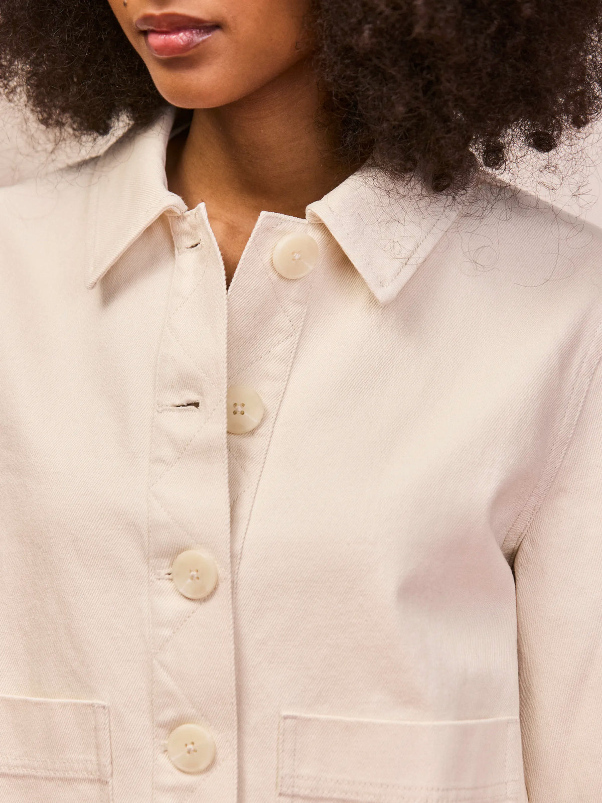 Ecru cotton twill denim jacket button and collar detail