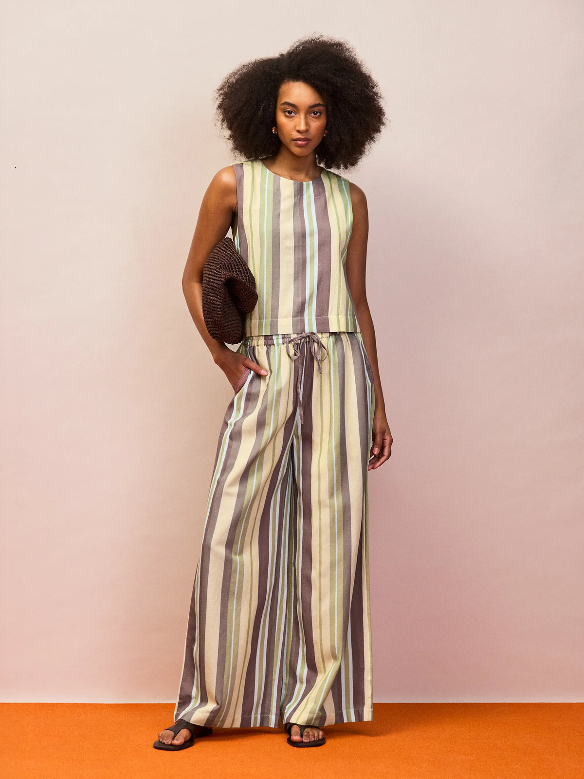 Green stripe linen blend cropped shell top styled with matching wide leg trousers