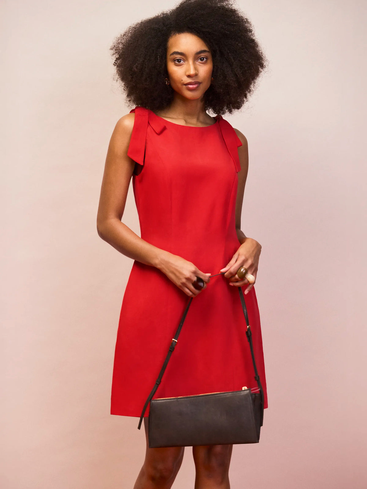 Red linen blend mini dress with shoulder tie detail front view