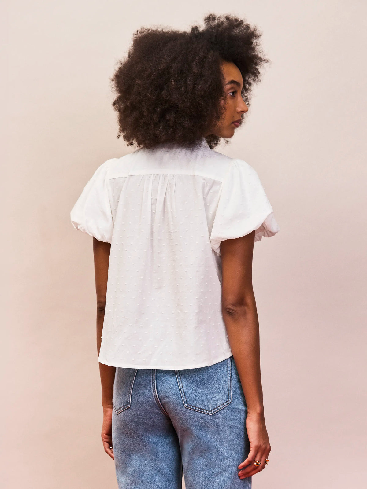 White dobby cotton blouse with gathered puff sleeves and delicate button detailing