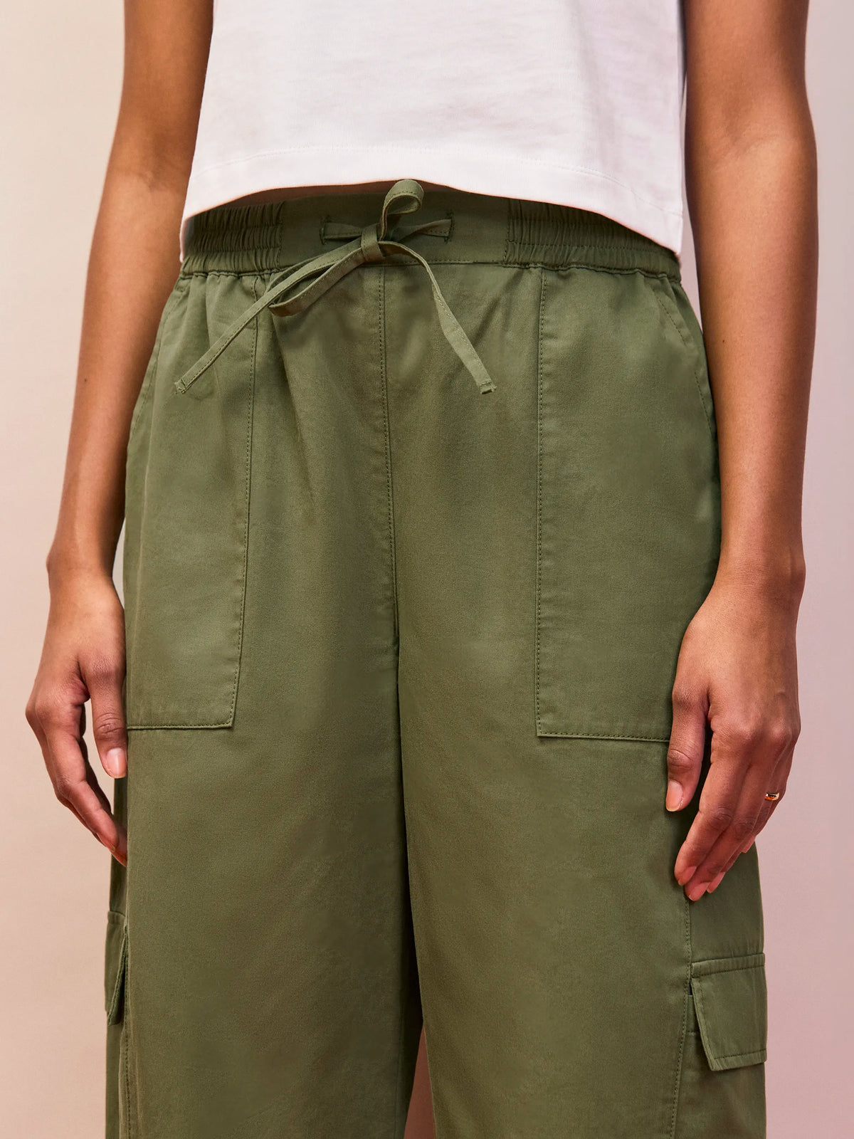 Khaki cargo pocket trousers with elasticated waist and patch pockets