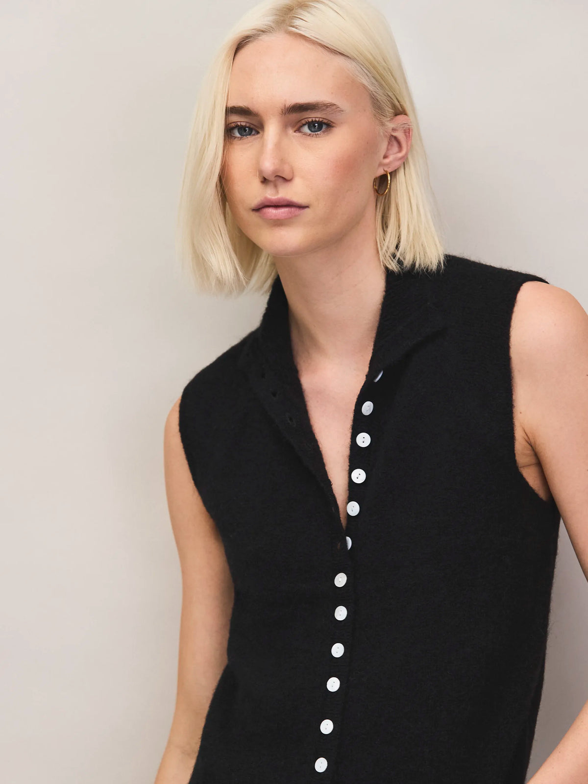 Black pearl button knit top