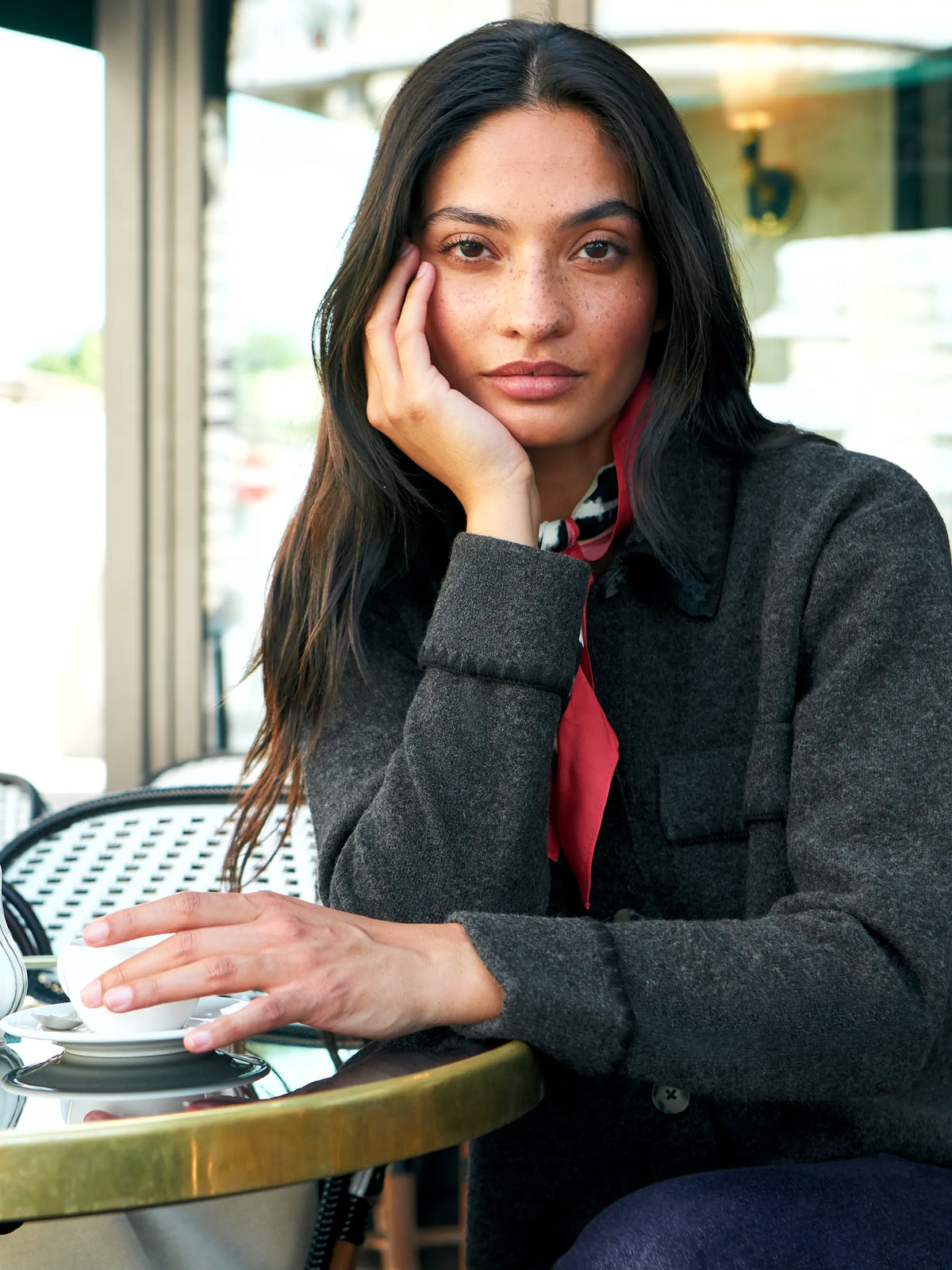 Charcoal wool-blend knit jacket with button front and patch pockets.