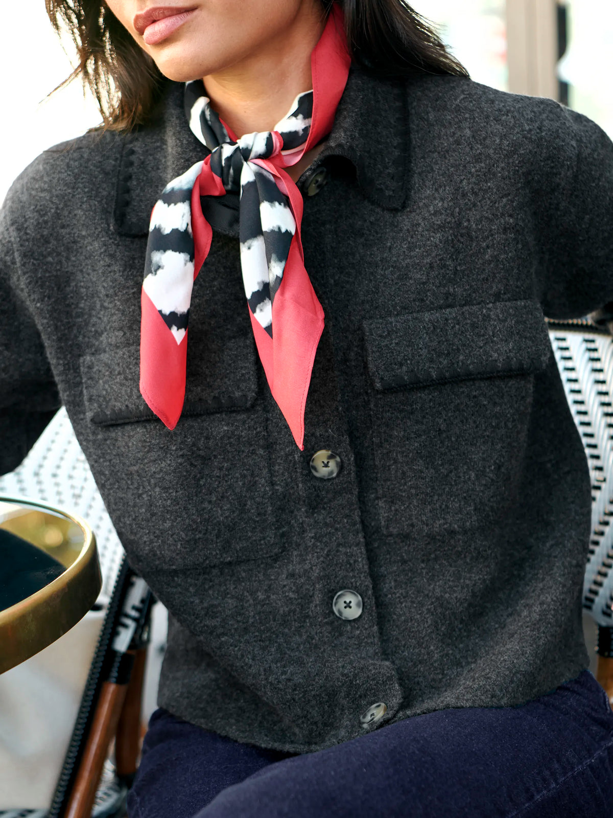 Charcoal wool-blend knit jacket with button front and patch pockets.