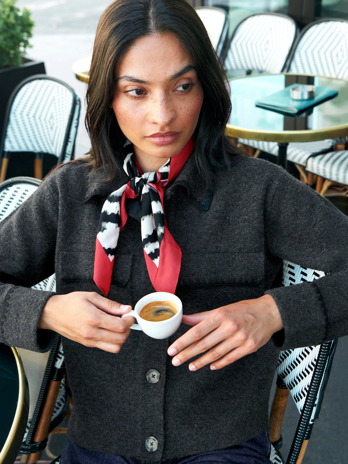 Charcoal wool-blend knit jacket with button front and patch pockets.