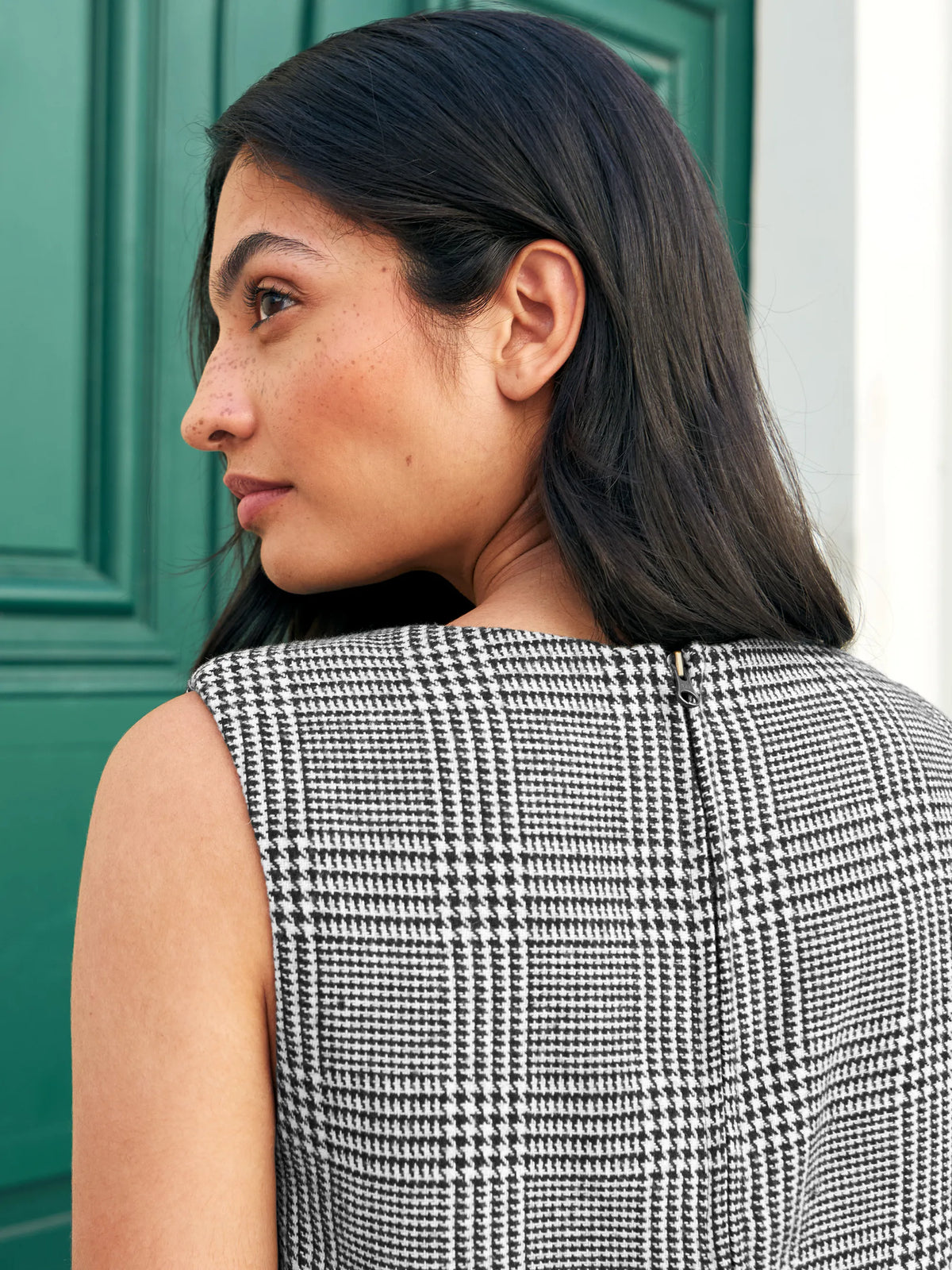 Mono check wool-blend sleeveless shell top with round neck.