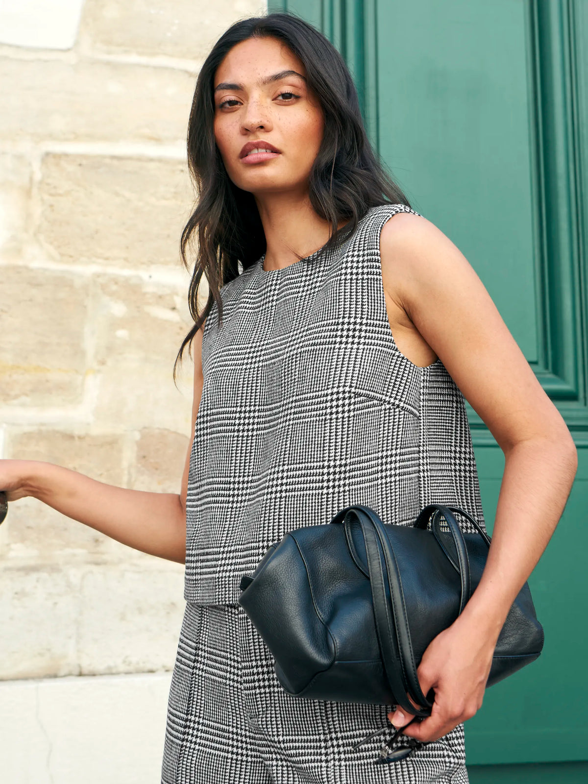 Mono check wool-blend sleeveless shell top with round neck.