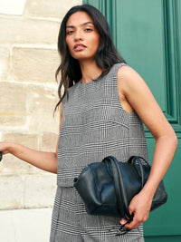 Mono check wool-blend sleeveless shell top with round neck.