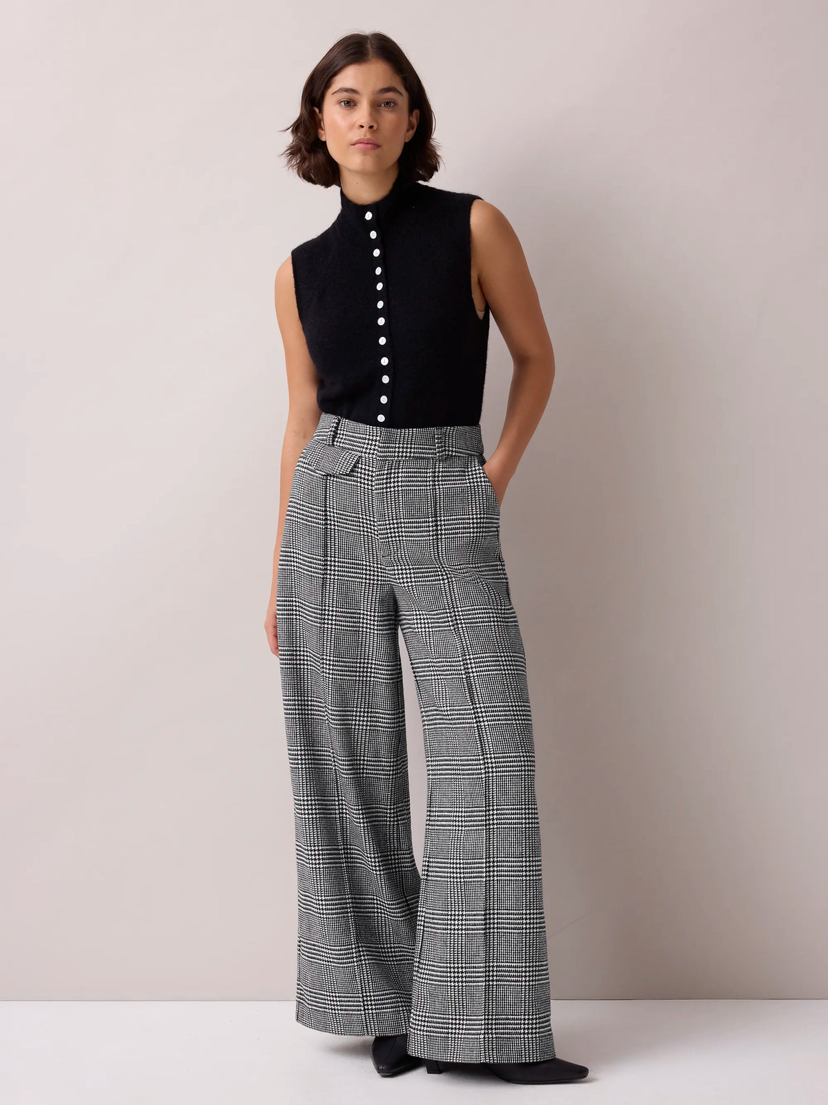 Mono check wool-blend wide-leg tailored trousers.