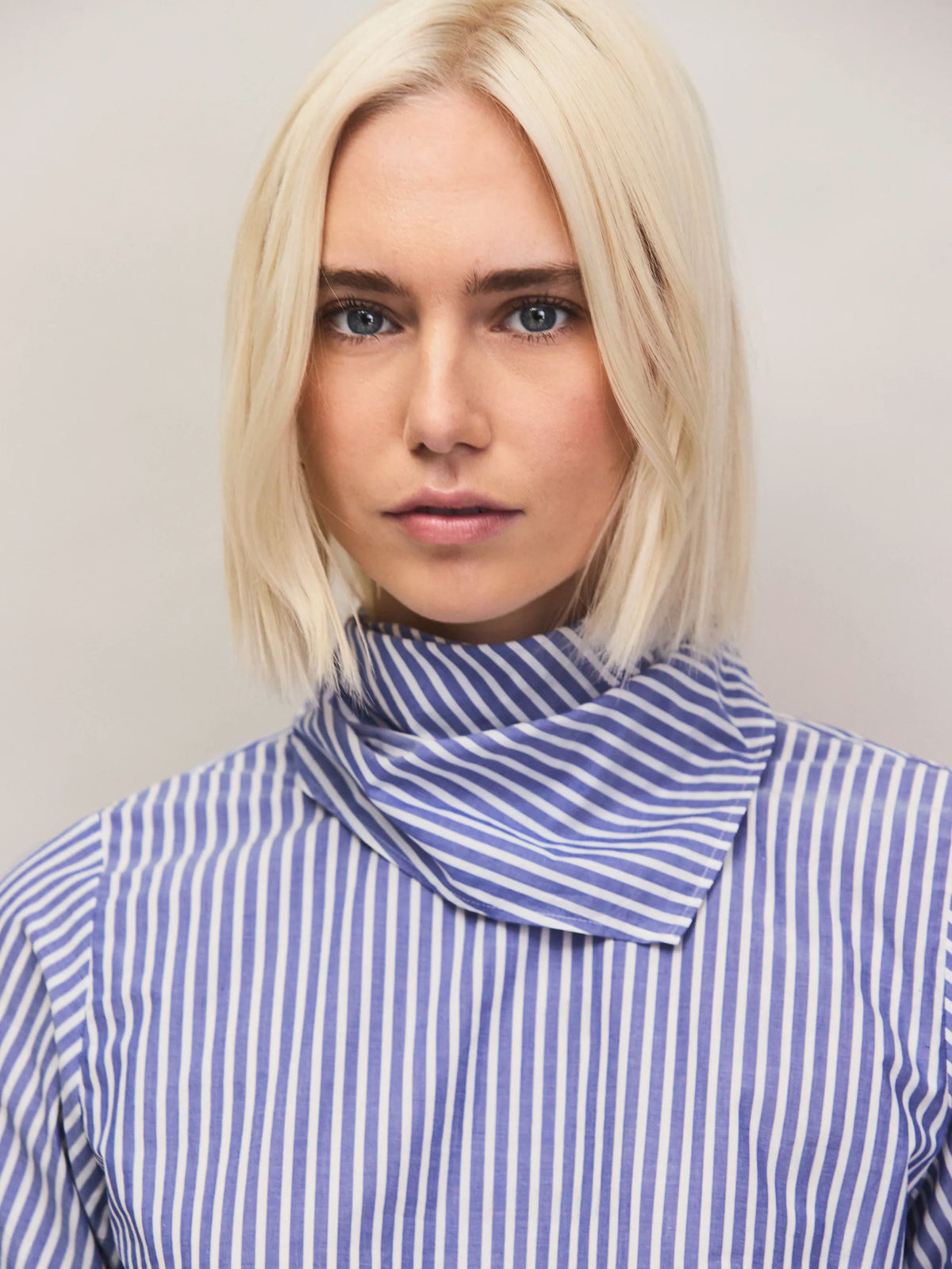 Blue stripe cotton shirt with scarf neckline.