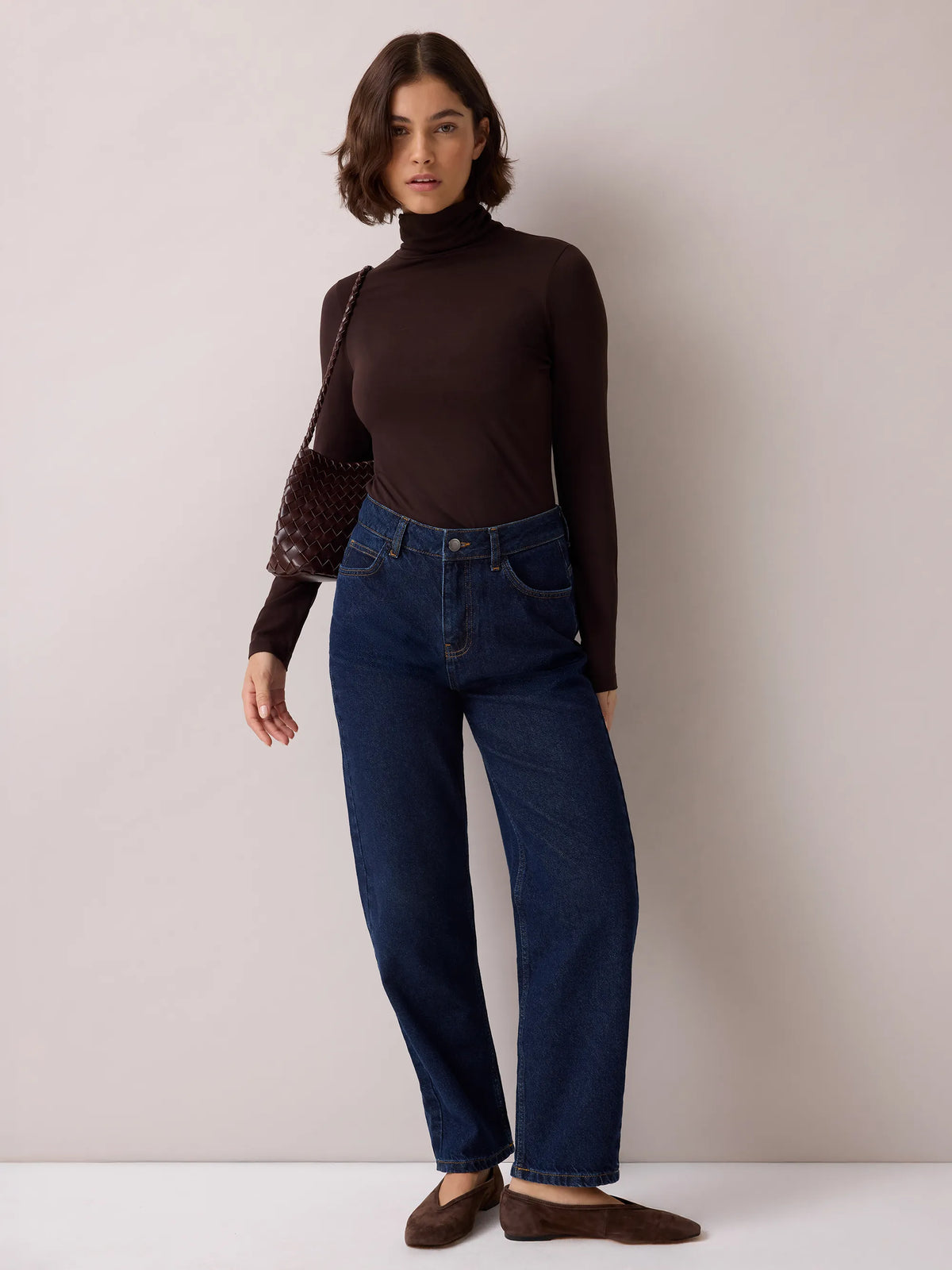 Brown cotton blend roll neck top.